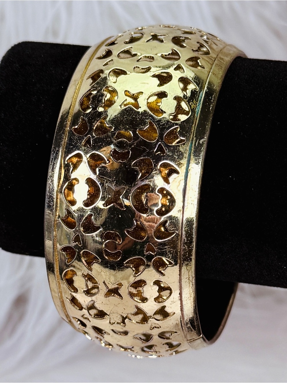 Goldtone, large wide bangle costume bracelet